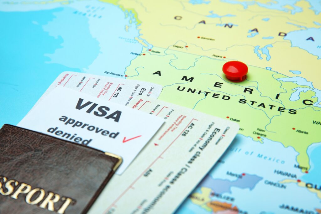 Passport, Tickets & Approved Visa on Map | Expert Immigration Case | U.S. Immigration Law Counsel