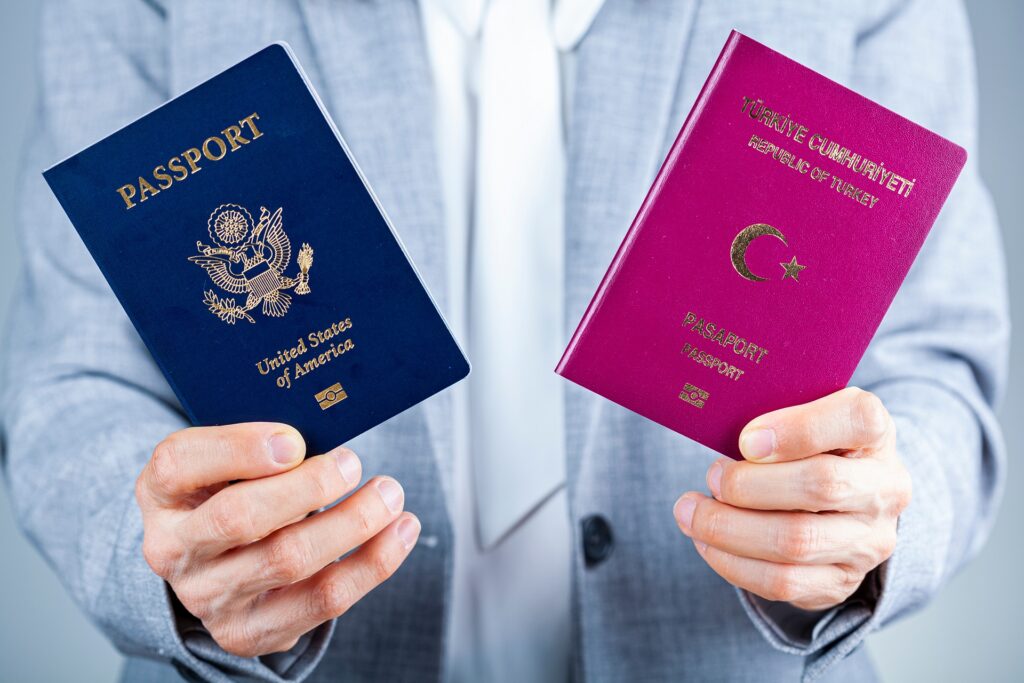 Woman Holding Turkish and US Passports | Expert Guidance for P Visa | U.S. Immigration Law Counsel
