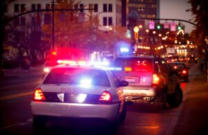 A police car pulling over a vehicle
