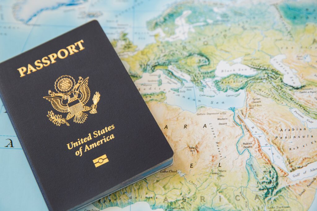 United States of America Passport on a Map | H1B Visa Attorneys | U.S. Immigration Law Counsel