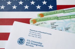 American flag with green cards on top of it