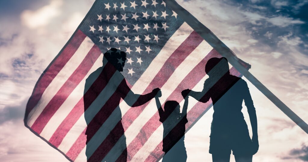 Silhouette of Family with American Flag Background | Naturalization | U.S. Immigration Law Counsel