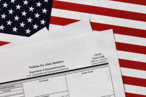 I-130 form on top of an American flag