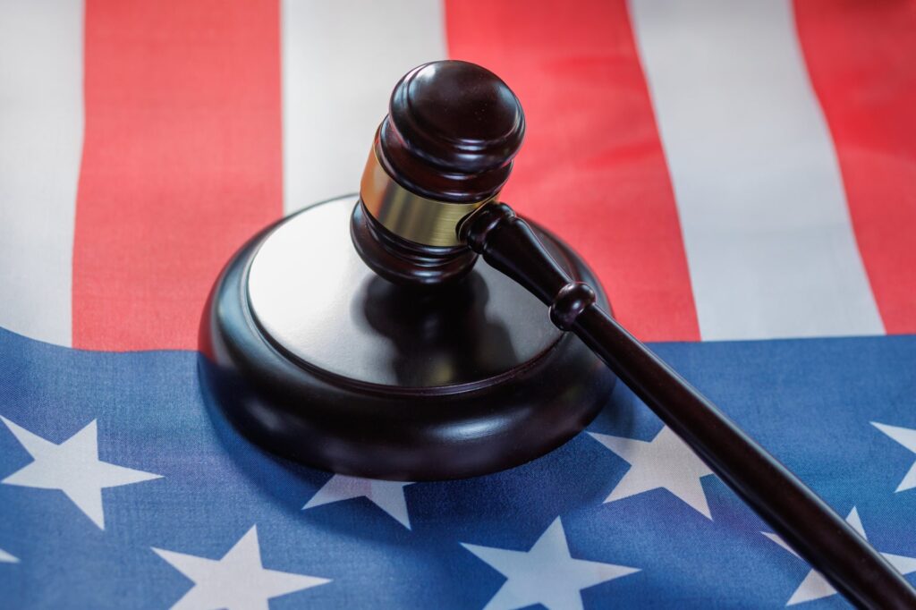 Gavel on top of american flag